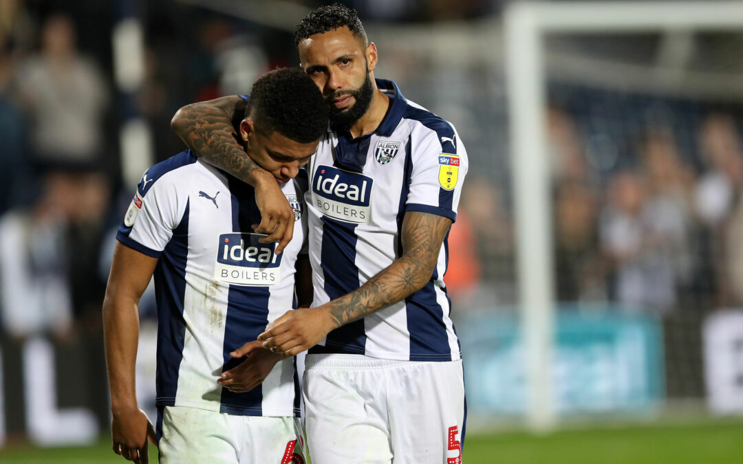 mason holgate of west bromwich albion is comforted by kyle bartl 1213233