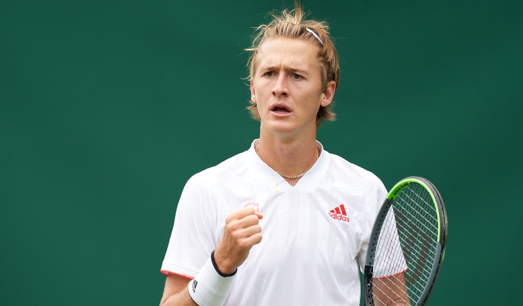 sebastian korda celebrates